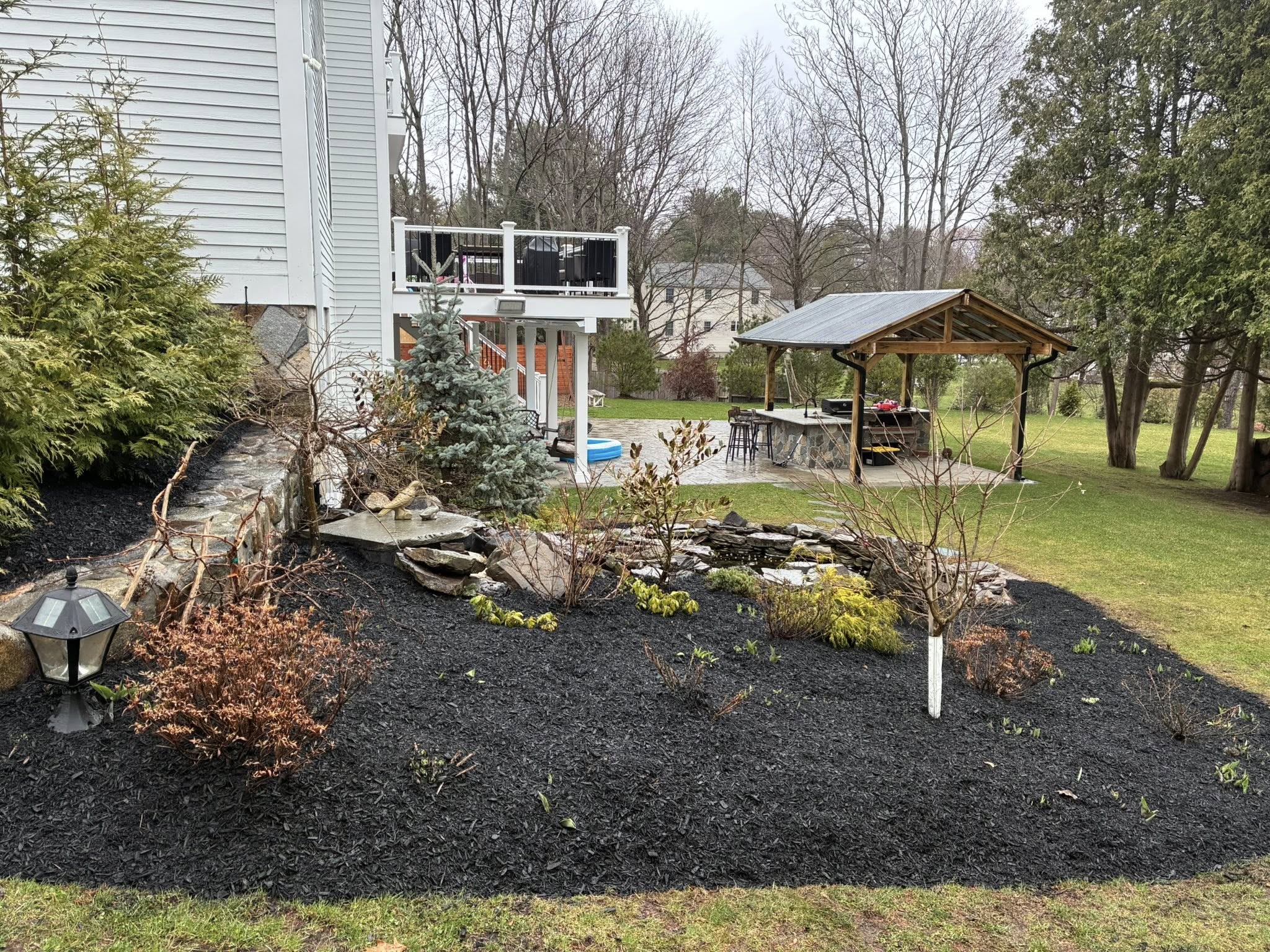 backyard landscaping design with gazebo patio seating area and garden layout